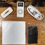 Apple Ipod Nano A1137 1ST Generation 1GB White Box Used. Price: $140.00.
