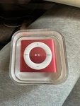 Apple Ipod Shuffle 2GB Of Storage Music Player Red/pink Colored New. Price: $66.99.