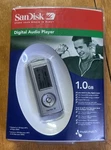 Rare New Sandisk SDMX1-1024-A118 Digital Audio MP3 Player Voice Recorder 1.0GB. Price: $55.99.