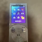 Sony Walkman Silver Character Decor Portable Media Player Music Video Used. Price: $81.50.