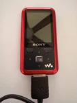 Sony Walkman NWZ-E354 Red 4GB Digital Music Player And Accessories Used. Price: $59.99.