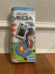 Tiger Massively Mini Media Player Video Photo Music Rechargable 76888 76881 New. Price: $37.00.