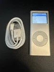 Apple Ipod Nano 2ND Generation Silver (4 Gb) Bundle - See Description Used. Price: $44.99.