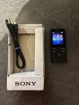 Sony Walkman NW-E393 4GB MP3 Player New Old Stock Open Box Complete. Price: $72.50.