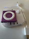 Apple Ipod Purple Shuffle 4TH Generation New Battery Installed Open Box Used. Price: $69.00.