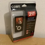 Coby 2GB Color Video MP3 Player 6 Hr /1000 Songs 2000 Photos New Sealed. Price: $29.99.