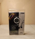 New Sealed Sony Walkman NW-E105 Silver ( 512 Mb ) Digital Music Player. Price: $120.00.