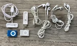 Bundle Set Of Two Apple Ipod Shuffles, Blue And Silver, Chargers Headphones Used. Price: $300.00.