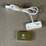 Apple Ipod Shuffle 2ND Generation A1204 1GB Gold W/ Oem Charging Dock, Tested Used. Price: $25.00.