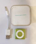 Apple Ipod Shuffle 4TH Generation Green (2GB) Excellent Condition With Box Used. Price: $69.99.