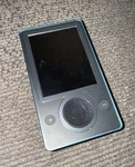 Microsoft Zune Black (30 Gb) Digital Media Player Model 1089 Used. Price: $75.00.
