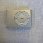 Apple Ipod Shuffle 2ND Generation Silver (1 Gb) Used. Price: $20.00.
