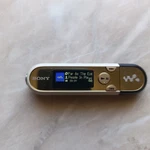 Sony Walkman NW-E042 White Gold And Black Color Digital Music Player 2GB Used. Price: $75.00.