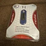 Nextar MP3 Player, 1GB Brand New In Unopened Package. Price: $19.00.