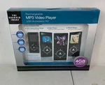 New. Sharper Image 4-IN-1 Digital Media & Video Player, Accessory Kit 4GB. Price: $19.49.