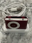 Apple Ipod Shuffle 2ND Generation Red (1 Gb) W/dock Mint Used. Price: $41.97.