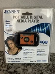 Jensen Portable Digital Media Player SMPV-4GBEB New & Sealed. Price: $19.99.
