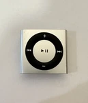 Apple Ipod Shuffle 4TH Generation Silver (2 Gb) Works Great Used. Price: $50.00.